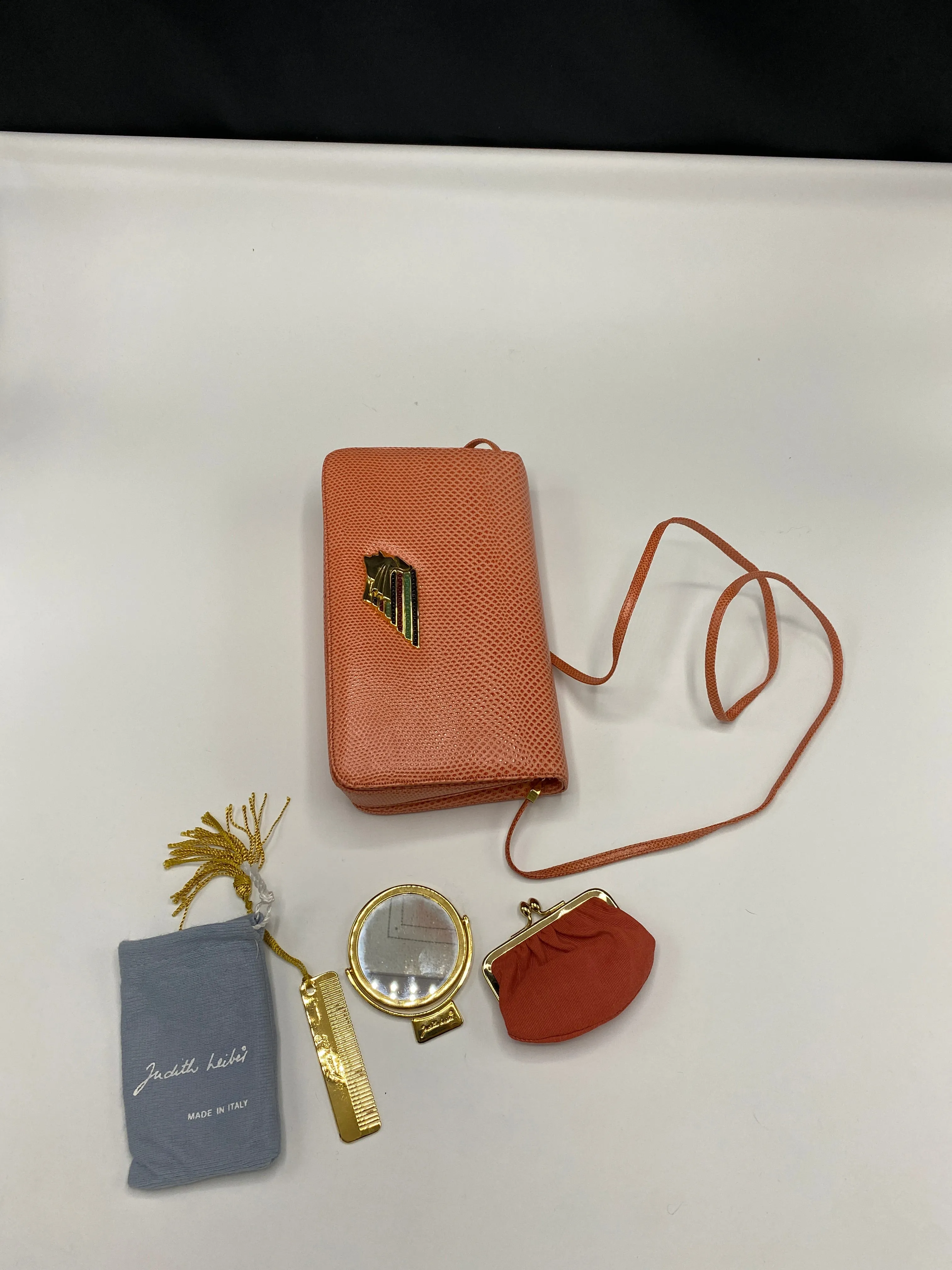 Judith Leiber Karung ( Lizard) Crossbody/Clutch with Native American embellishment